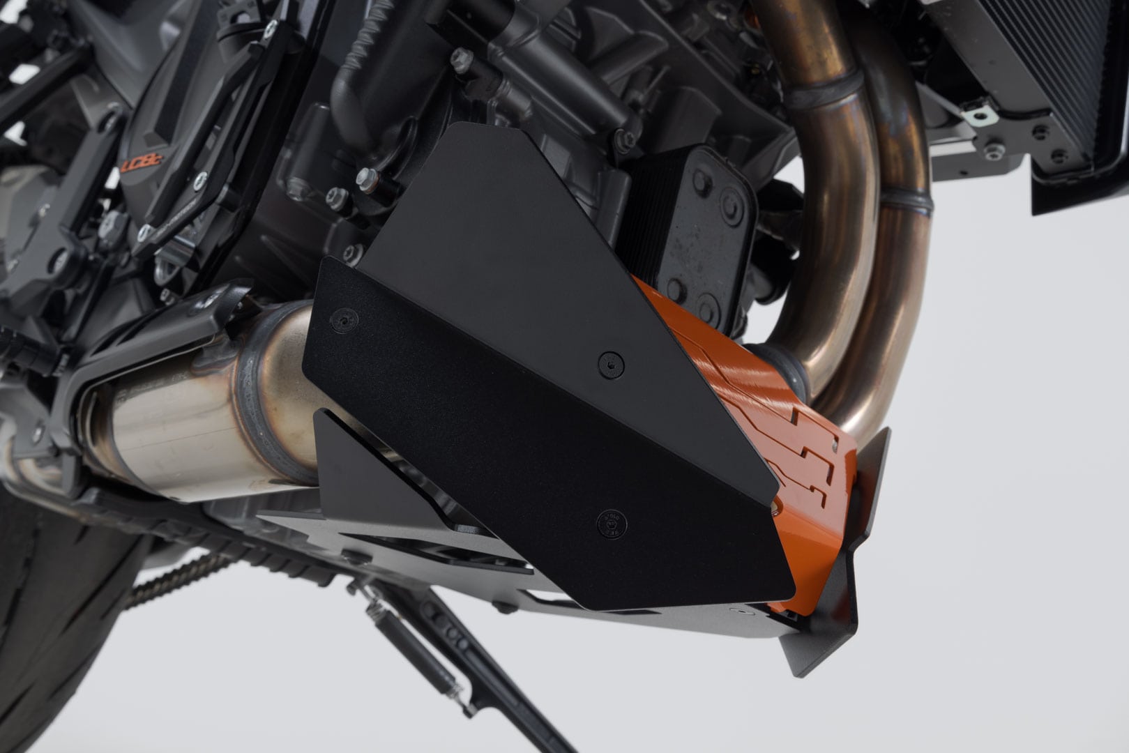 Predný spojler SW-Motech, oranžovo-čierny. KTM 990 Duke (23-).